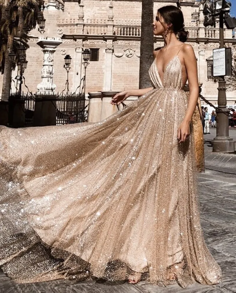 Abiti da ballo senza schienale scintillanti Abiti da sera lunghi con paillettes con scollo a V in oro Cinghie senza spalline Abi