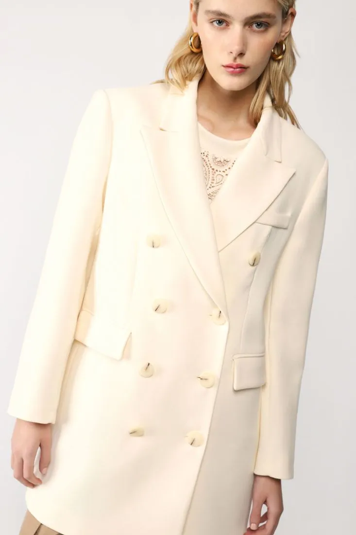 Cappotto lungo doppiopetto monocolour con revers a lancia